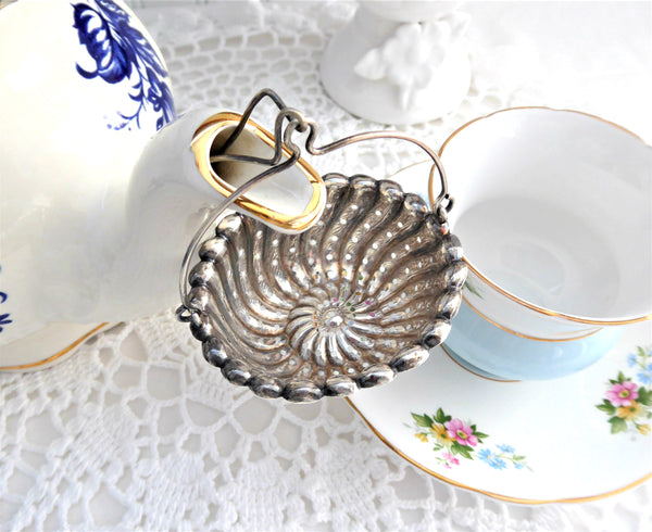 Tea strainers and infusers in Antique Sterling Silver Bryan