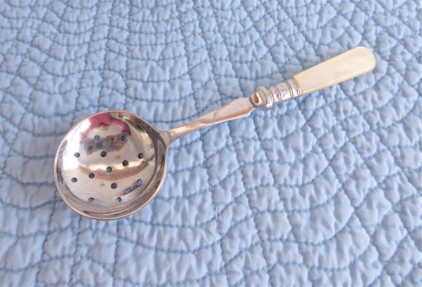 Strainer spoon, British