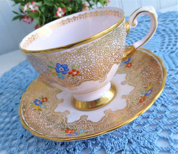 Tuscan handpainted nasturtium heavy gold teacup top and saucer, fine bone china made in England