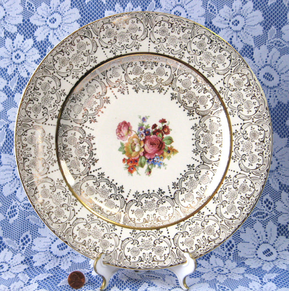 http://www.antiquesandteacups.com/cdn/shop/products/1940s-HomerLaughlin-gold-filigree-charger-plate-a_grande.jpg?v=1497399472