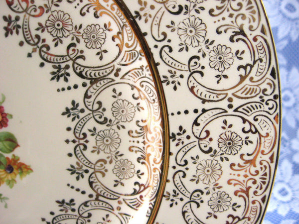 http://www.antiquesandteacups.com/cdn/shop/products/1940s-HomerLaughlin-gold-filigree-charger-plate-c_grande.jpg?v=1497399477