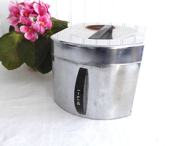 http://www.antiquesandteacups.com/cdn/shop/products/1950s-Chromex-retro-chrome-tea-canister-b_grande.JPG?v=1498001929