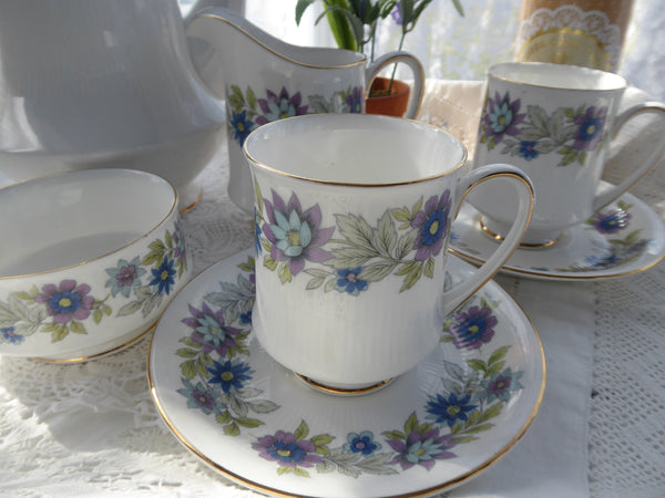 Vintage 1950s-1960s elegant factory Paragon fine bome china tea cup and saucer duo