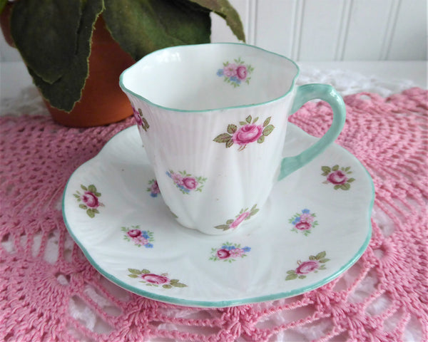 http://www.antiquesandteacups.com/cdn/shop/products/1950s-Shelley-tall-dainty-Rosebud-demi-teacup-ab_grande.jpg?v=1637177821