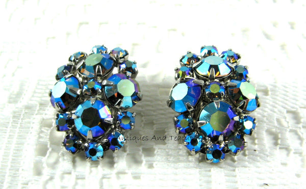 Vintage cheapest 1950’s Aurora Borealis Cluster Clip Earrings in Original Packaging