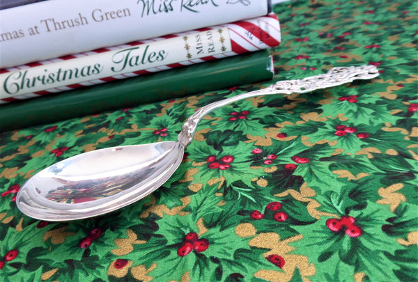 http://www.antiquesandteacups.com/cdn/shop/products/1959-spoon_Sweden-serving-sterling-silver-reticulated-handle-b_grande.jpg?v=1576783394