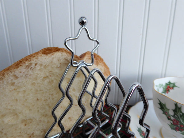 http://www.antiquesandteacups.com/cdn/shop/products/1970s-toast-rack-Christmas-trees-chrome-6slice-b_grande.jpg?v=1573579316