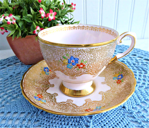 Elegant Pink Cup And Saucer Tuscan Enamel Accents Gold Lace 1920s