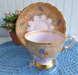 Elegant Pink Cup And Saucer Tuscan Enamel Accents Gold Lace 1920s Bone China