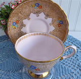 Elegant Pink Cup And Saucer Tuscan Enamel Accents Gold Lace 1920s Bone China