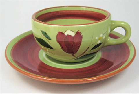 https://www.antiquesandteacups.com/cdn/shop/products/1950s-Stangl-USA-Magnolia-cupandsaucer-red-green-a_large.jpg?v=1648082282