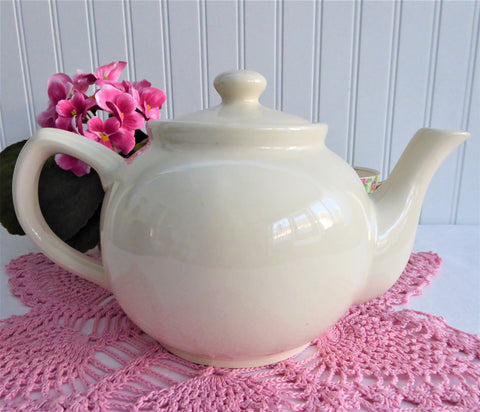 https://www.antiquesandteacups.com/cdn/shop/products/1980s-teapot-pink-roses-4cup-c_large.jpg?v=1646352518